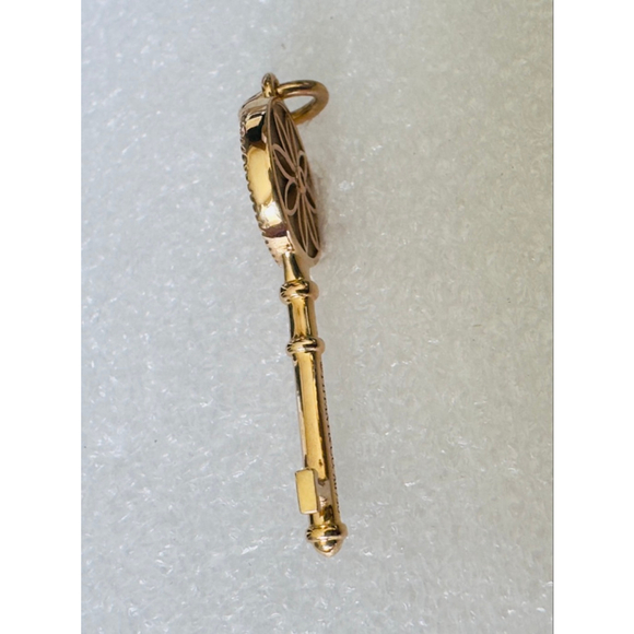 Tiffany & Co. 18k Rose Gold Daisy Key with a Diamond, Pendant 1.5" - Picture 7 of 8